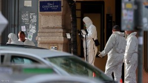 Hungarian police officials investigate in Budapest after an explosion of unknown origin injured two passing police officers on September 25, 2016. The explosion blew out windows and damaged walls of the building. Two police officers who were on patrol were injured and taken to hospital, said the statement on the police website. / AFP / FERENC ISZA (Photo credit should read FERENC ISZA/AFP/Getty Images)