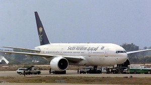 BAGHDAD, IRAQ:  The Saudi Arabian Airlines Boeing 777, hijacked while on a Jeddah-London flight, sits on the tarmac at Baghdad's Saddam International airport before taking off to Riyadh 15 October 2000. The plane left about 24 hours after landing in the Iraqi capital with its 90 passengers and 14 crew aboard. The hijackers, now in the hands of the Iraqi authorities, were both Saudi sergeants who called for an inquiry into human rights abuses in Riyadh and requested political asylum. (Photo credit should read KARIM SAHIB/AFP/Getty Images)